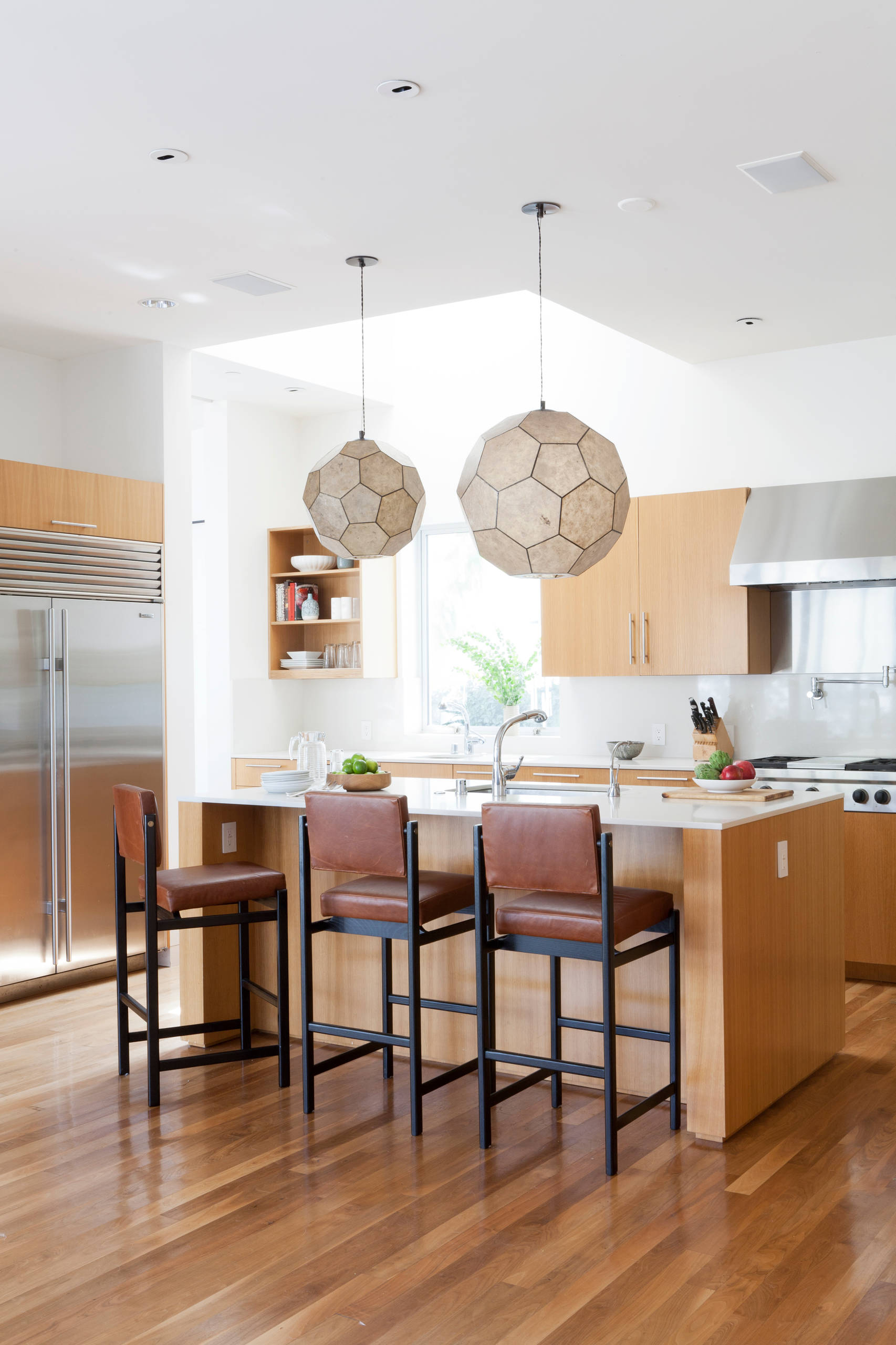 Simple Japandi kitchen with hardwood floor