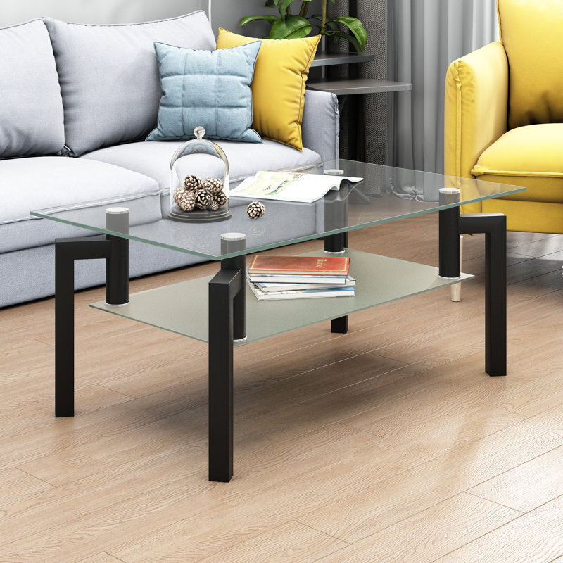 Airy wrought iron and glass table