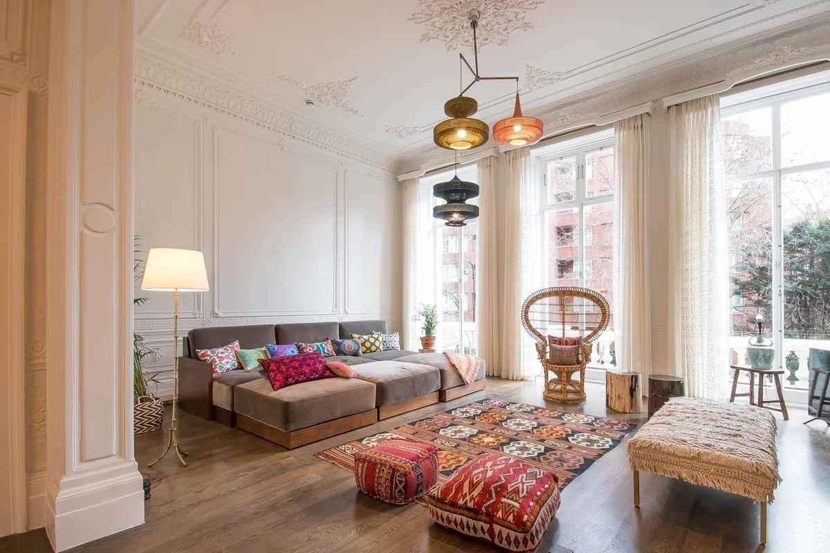 Bohemian living room with beige walls