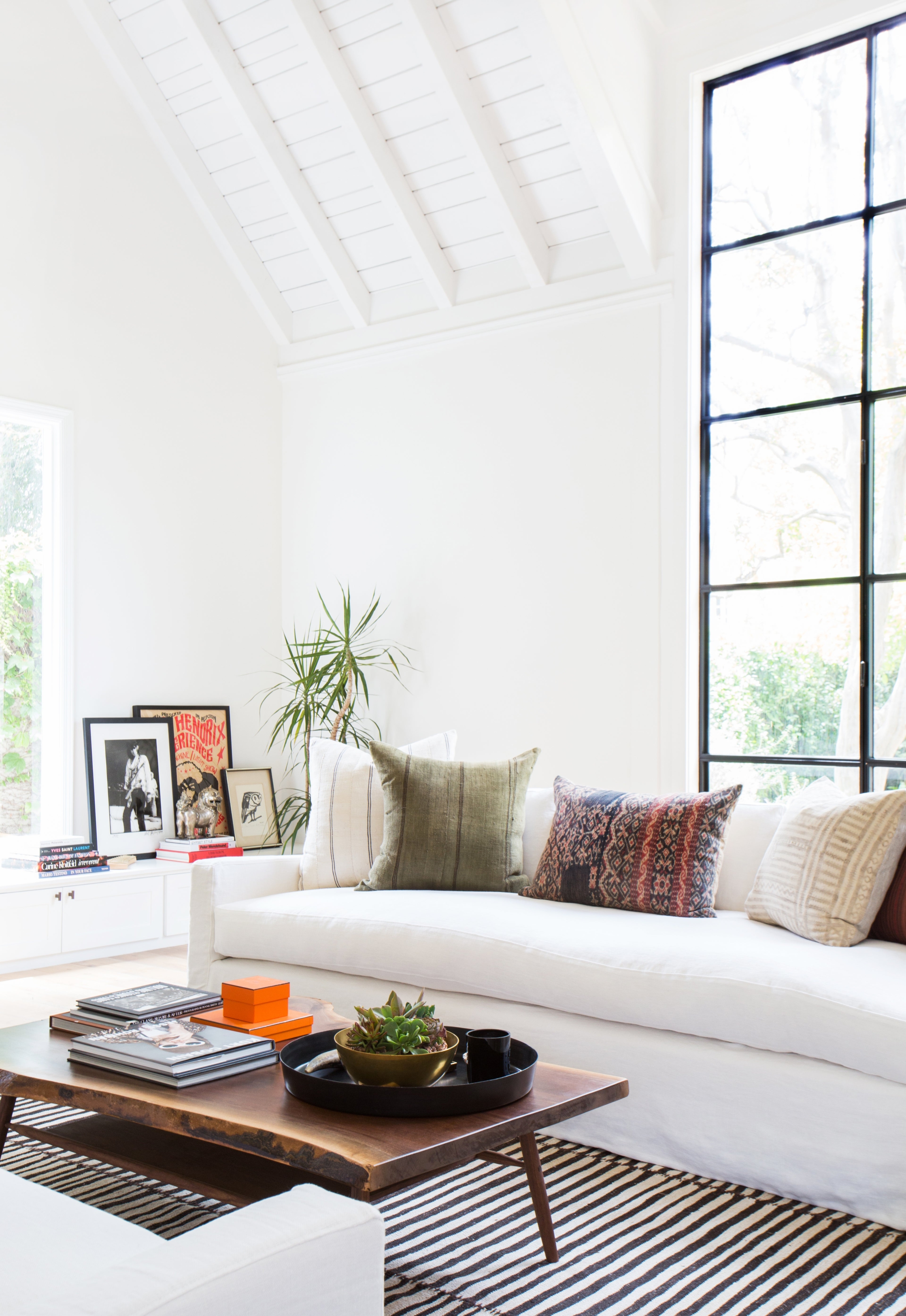 Bright white living room with comfortable couches