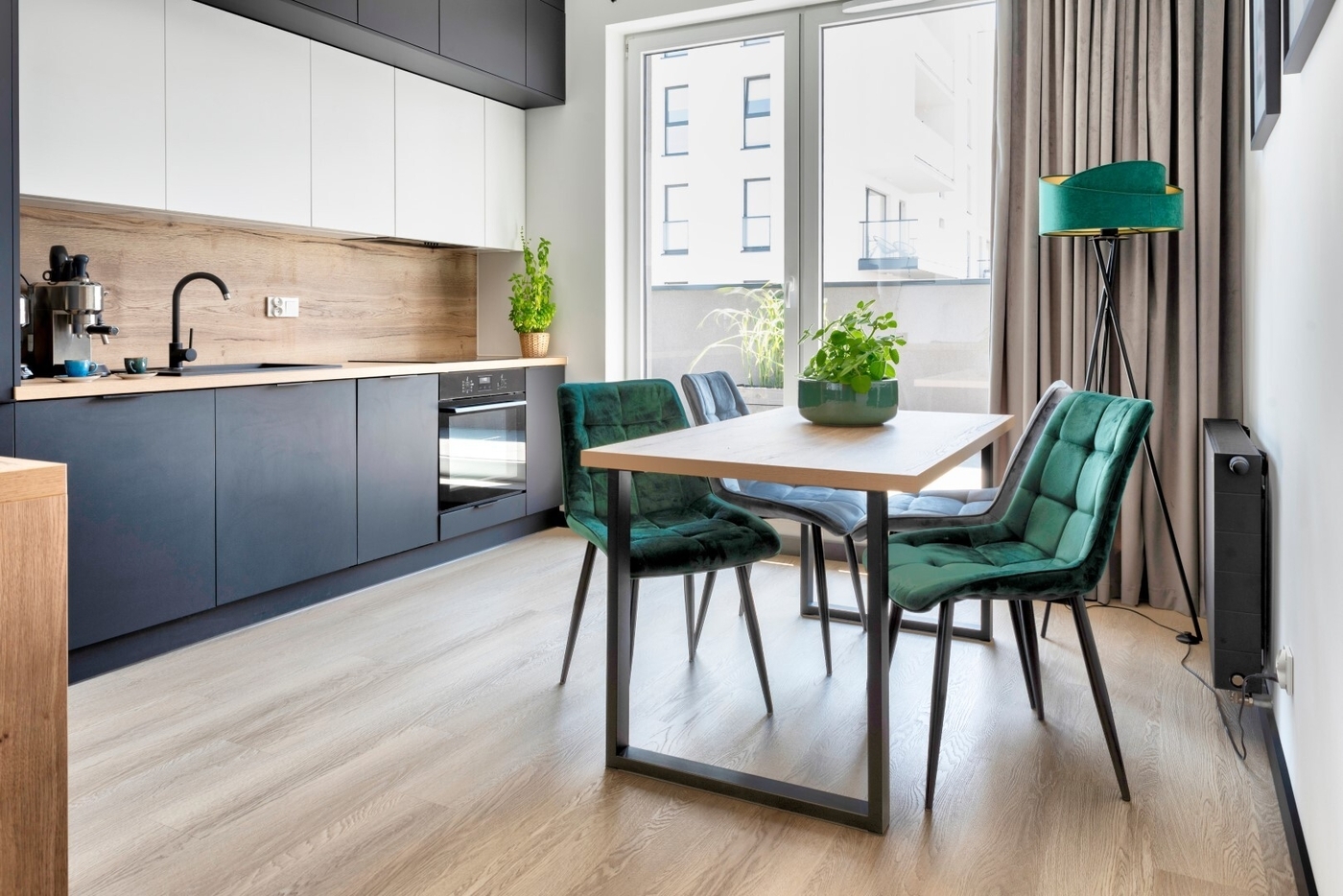 Dining table and stylish green chairs