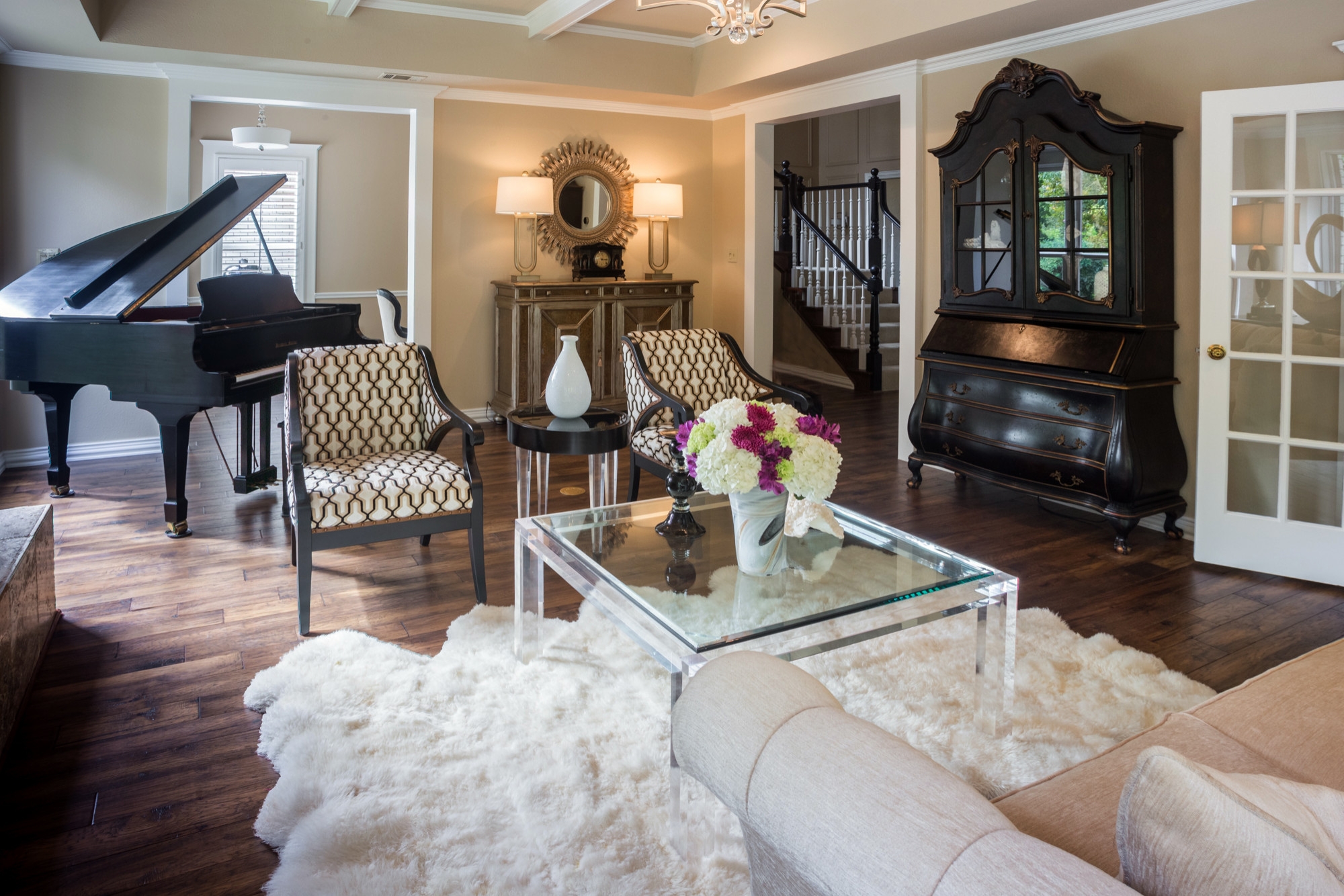 Eclectic living room with a glass table