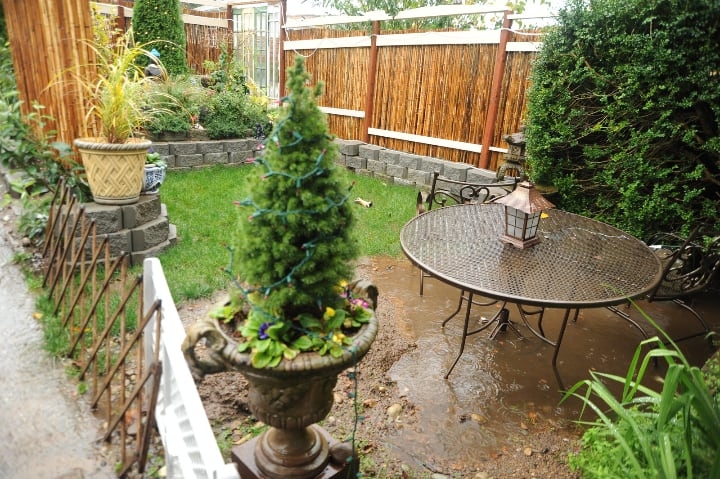 flooded muddy garden badly needinng a landscape architect