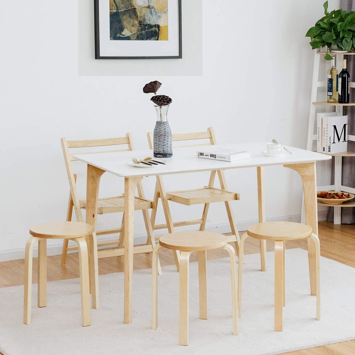 Four backless birchwood bar stools