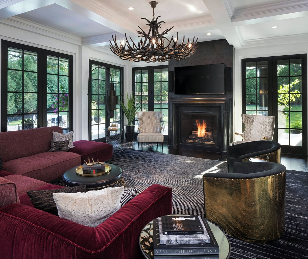 Hollywood regency front room with a fireplace