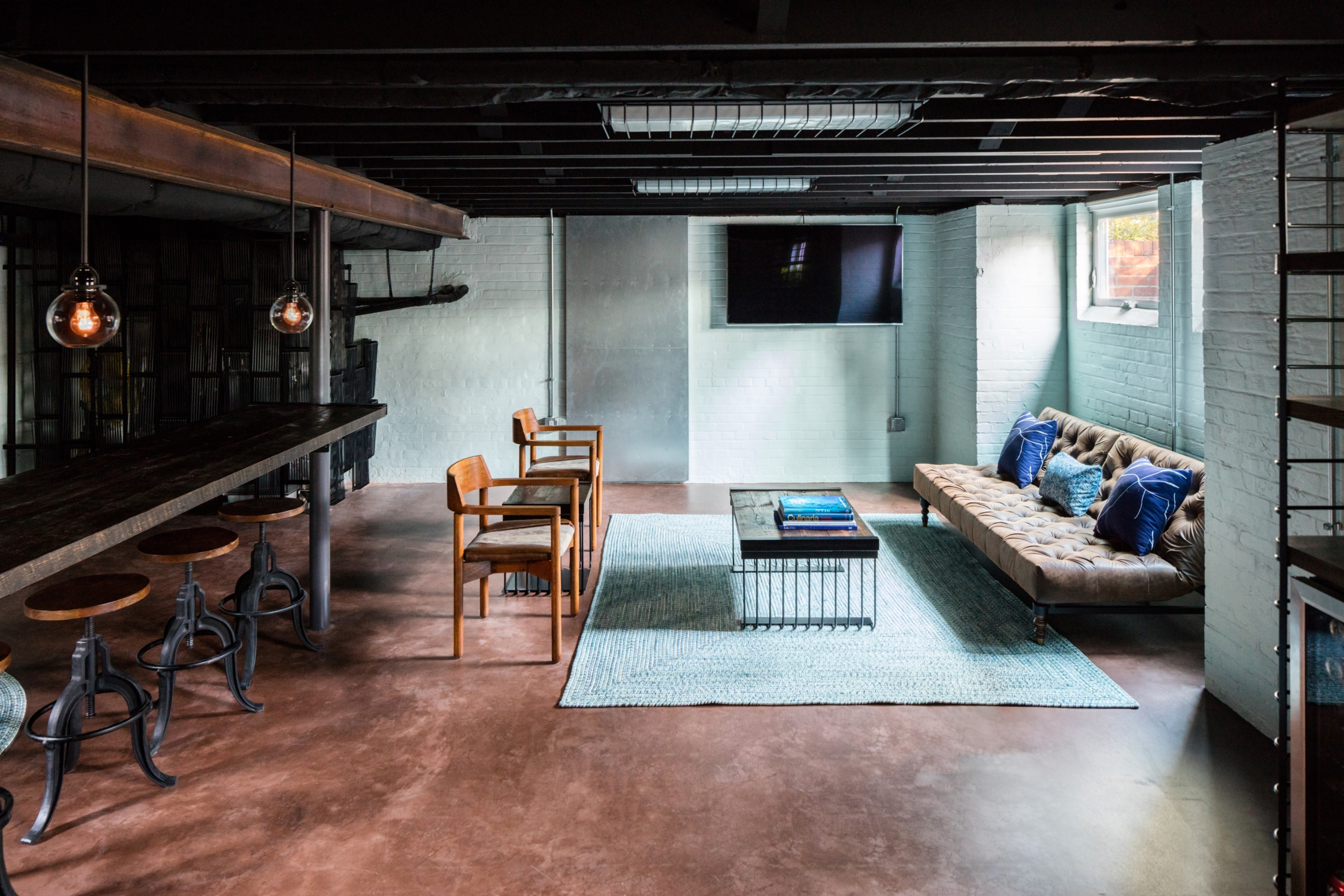 Industrial basement with a seating area