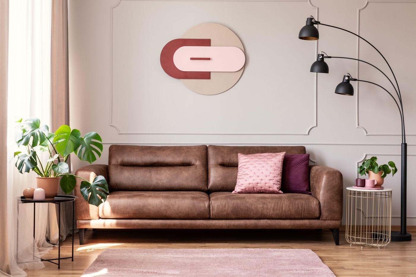 Leather couch with pillows