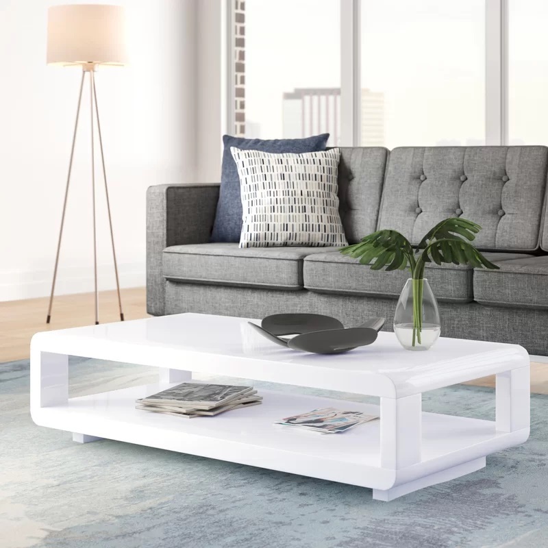 Low profile white glossy coffee table