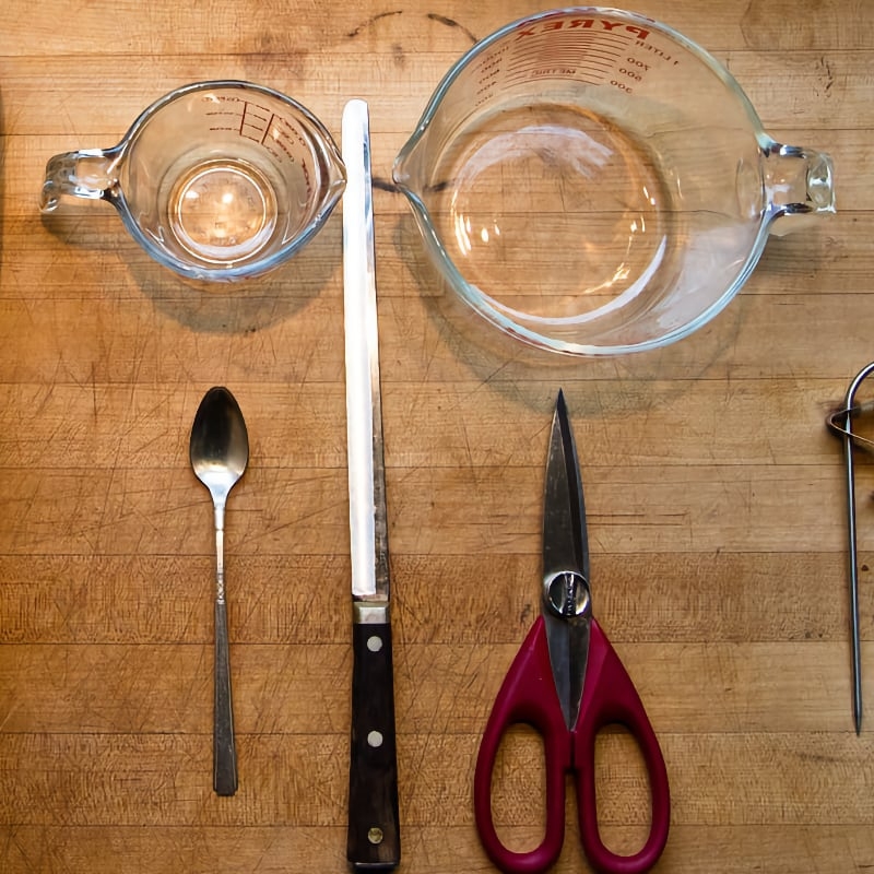 measuring cup spoon and curd knife