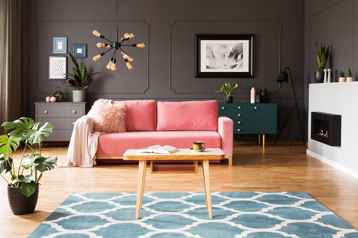 Pink sofa in grey living room