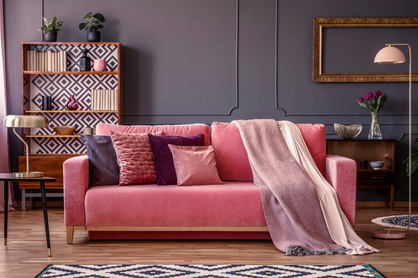 Pink sofa with pillows