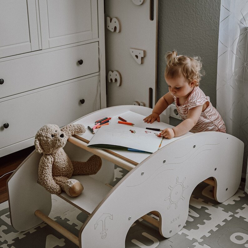 Rocking boat toy with table and seat