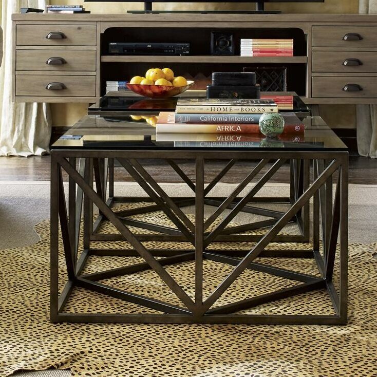 Transitional glass and iron coffee table