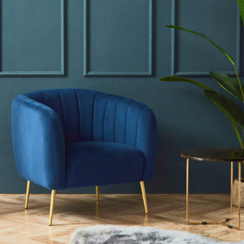 Tufted barrel accent chairs