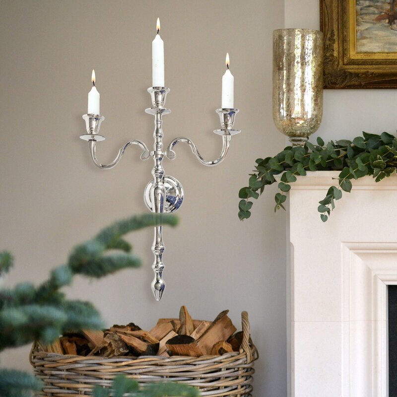 Wall mounted metal candelabra