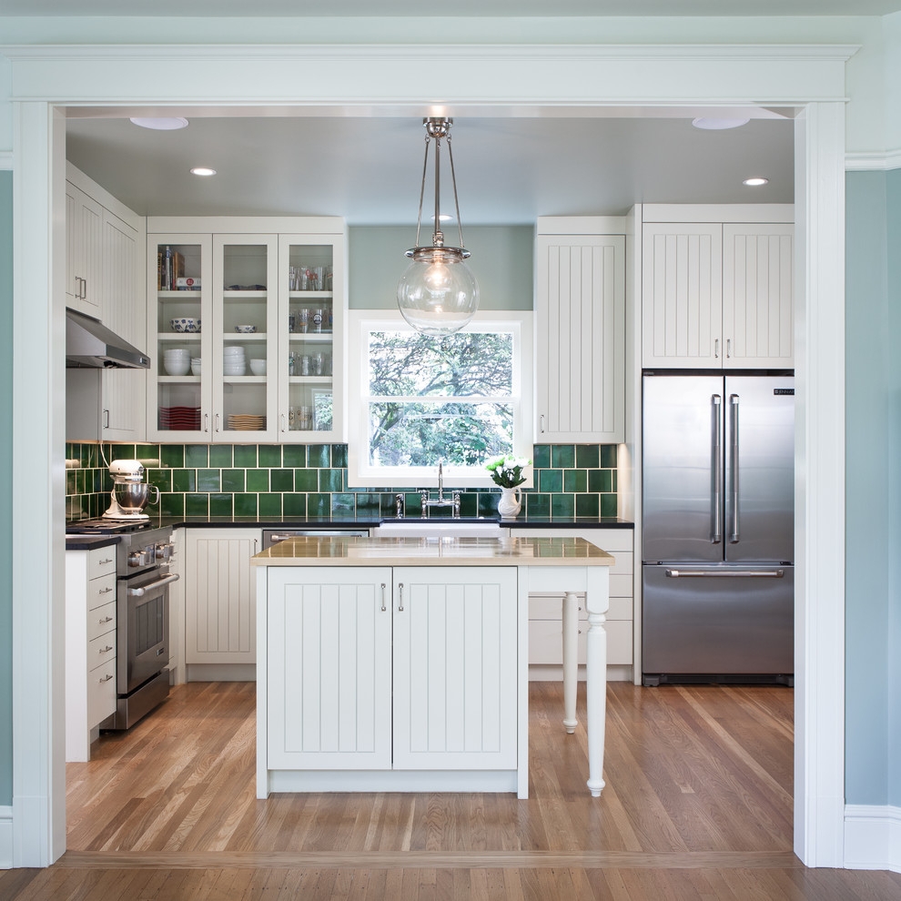 White kitchen island with cupboards