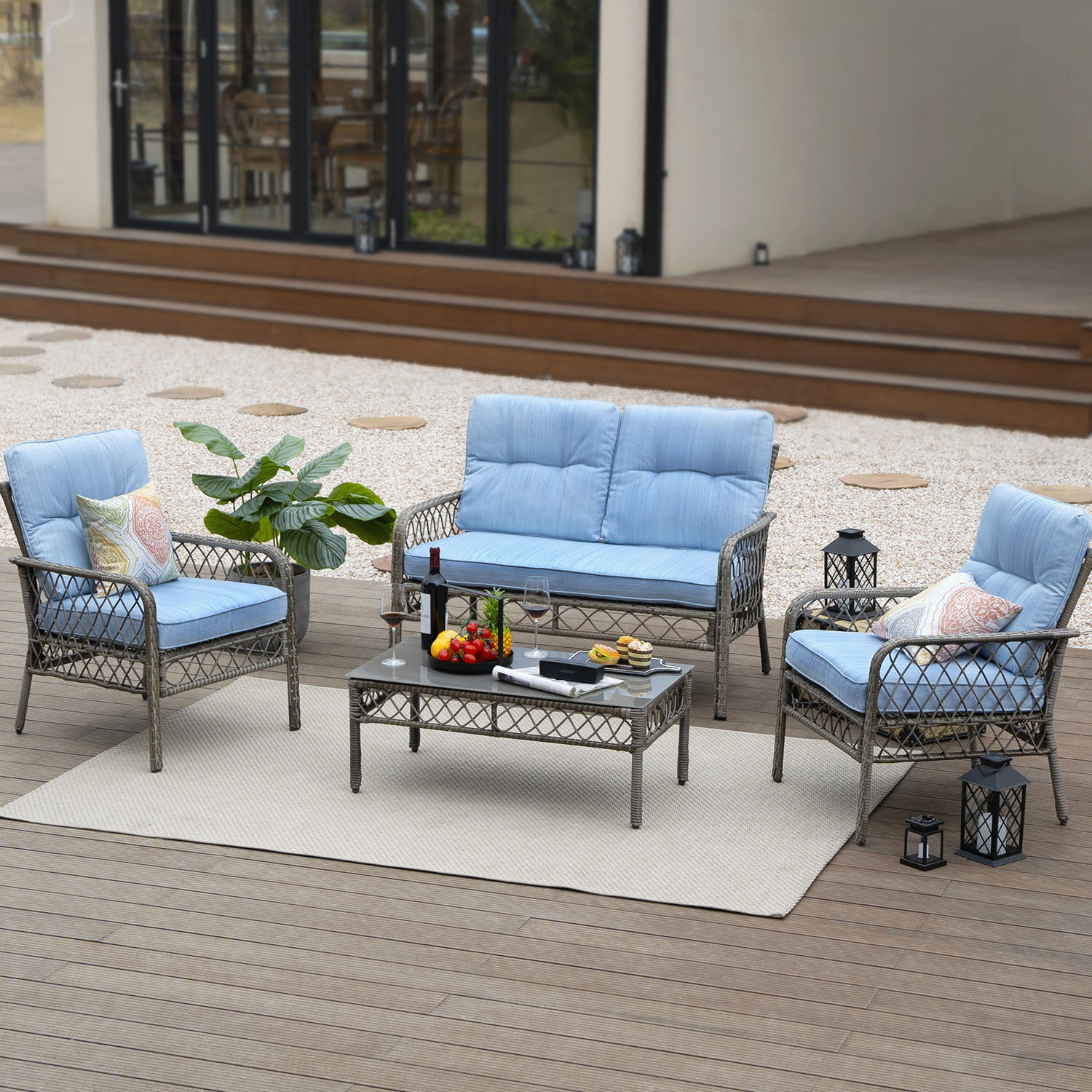 Wicker themed stainless steel seating group