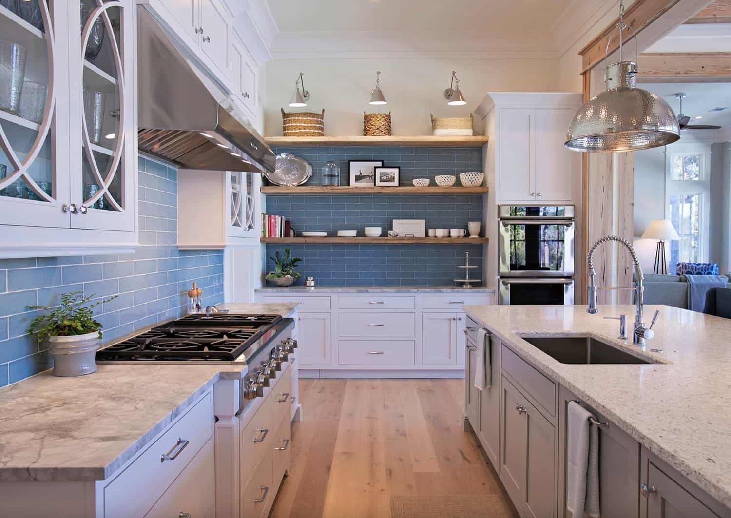 Wooden kitchen shelves on a tiled wall