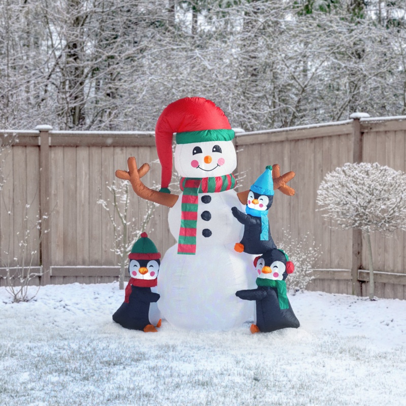 Christmas Penguins Building Snowman Inflatable