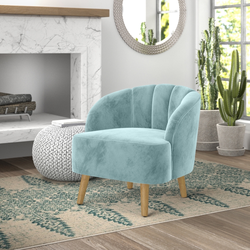 Eye-Catching Barrel Chair with McCobb-Style Legs