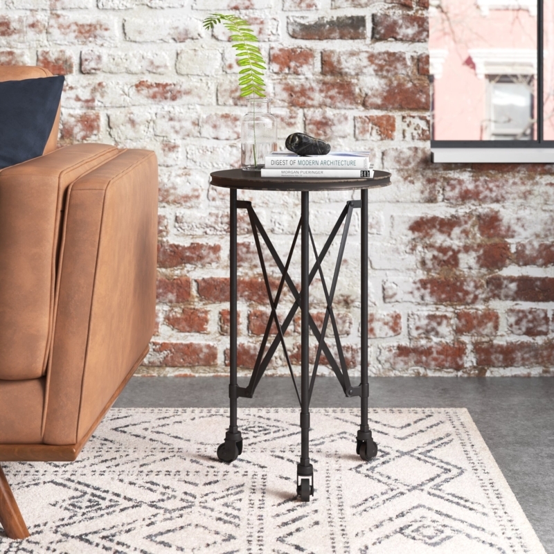 Aged Industrial-Look Accent Table on Casters