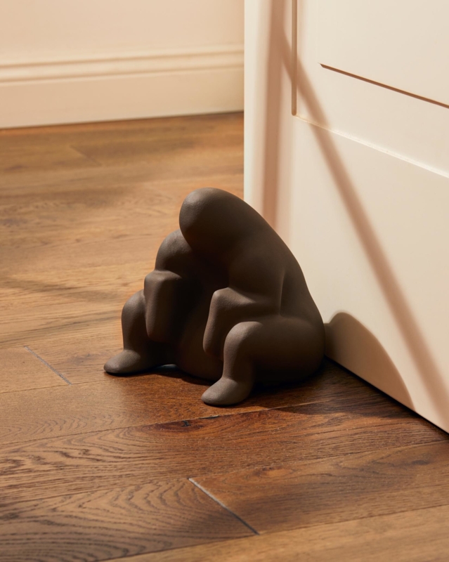 Expressive Doorstop Sculpture