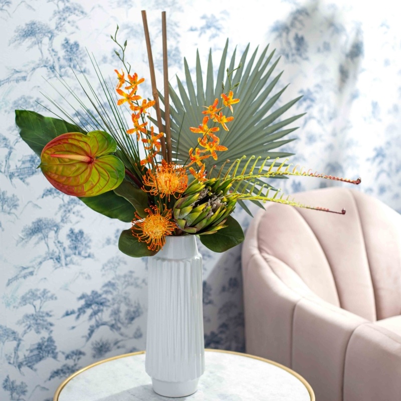 Exotic Sunrise - Orange Orchid, Protea, Monstera Leaf & Fan Palm Tropical Flower Arrangement