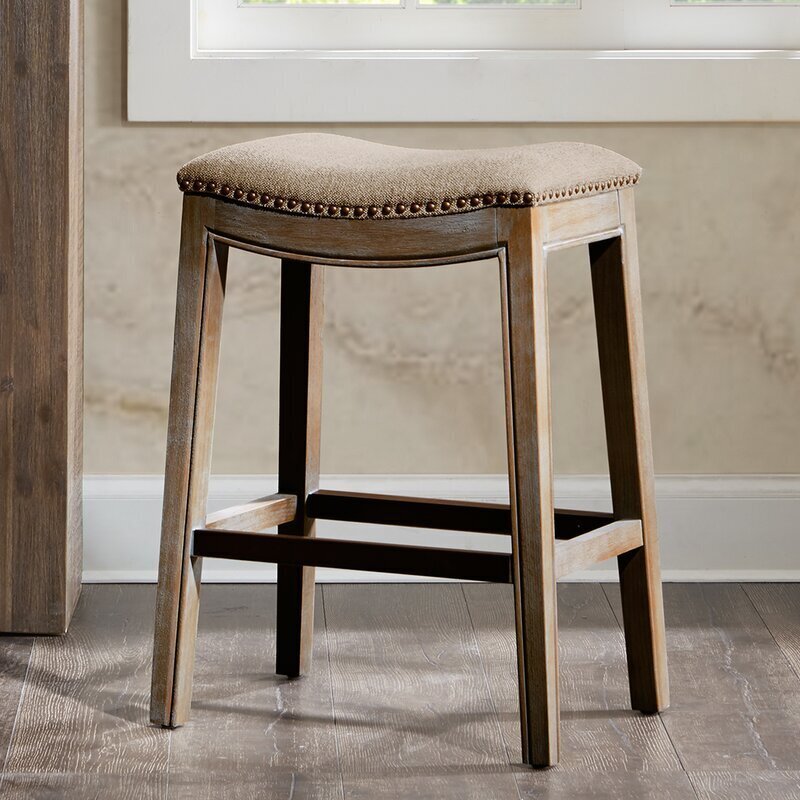 Nailhead trim saddle bar stool