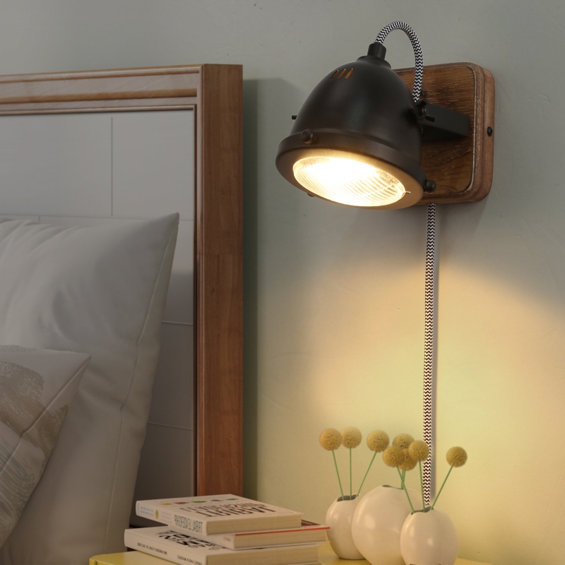 Adjustable Black Wall Sconce with Distressed Wood Backplate