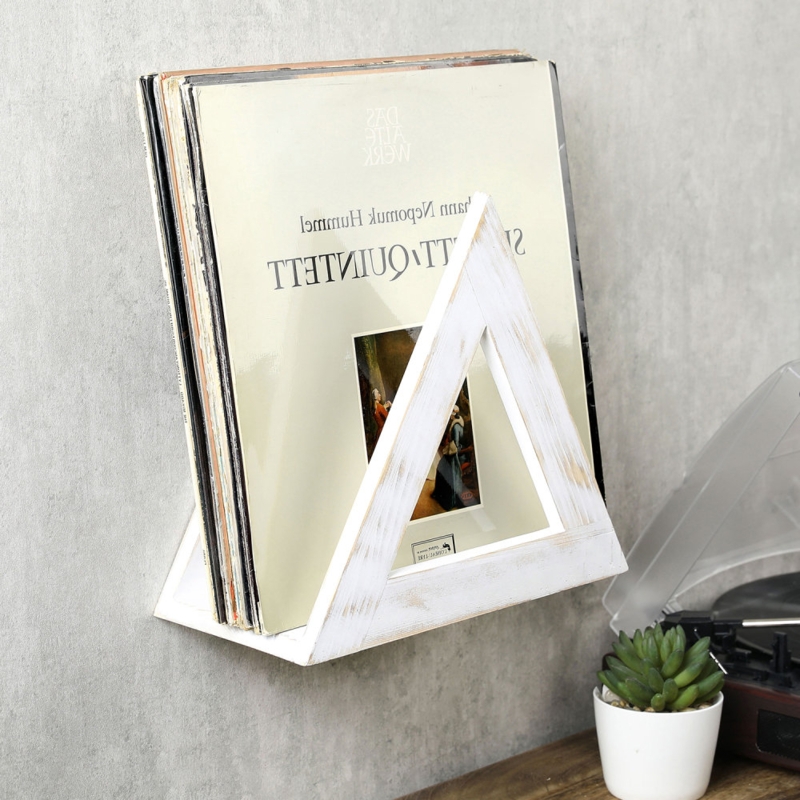 Wall-Mounted Magazine Holder with Triangular Cutout Design