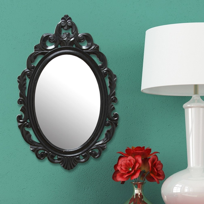 Antique-Inspired Oval Mirror with Floral Motifs