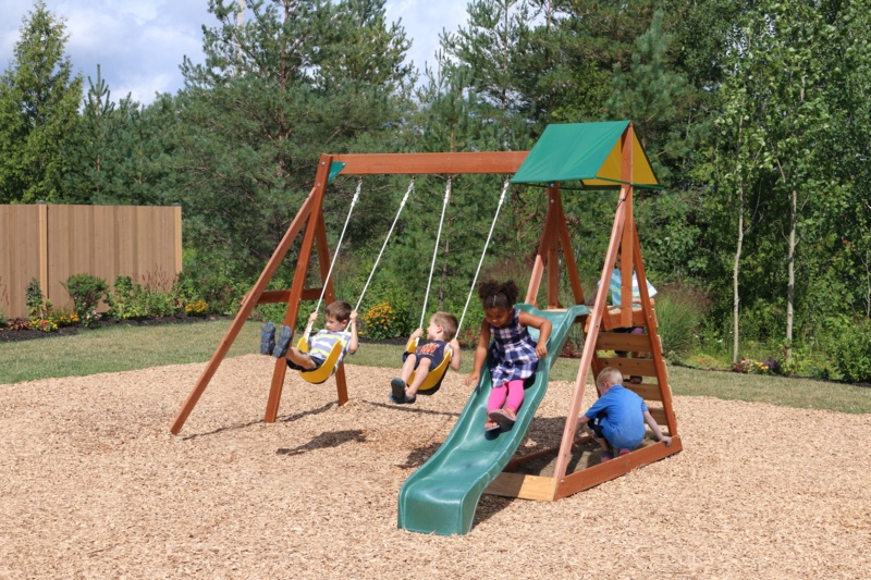 KidKraft Sunview II Wooden Outdoor Swing Set with Swings, Slide and Rock Wall