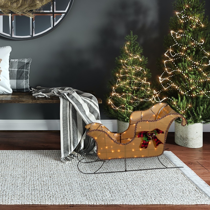 The Holiday Aisle® Sleigh Figurine Shiny Gold Sleigh Christmas Decoration, 22"