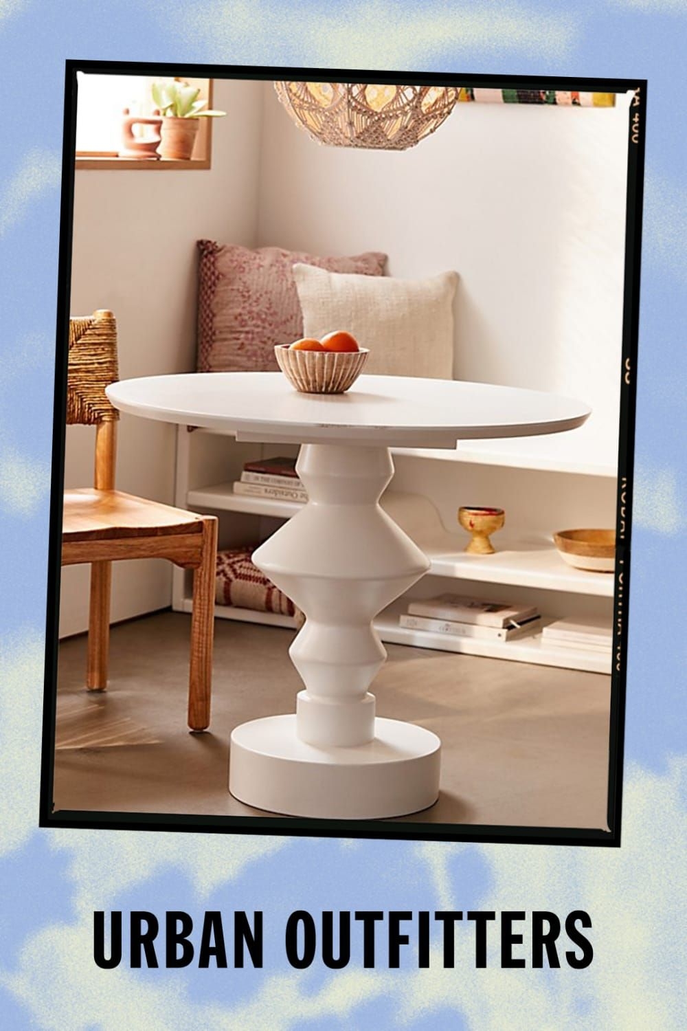Vera Pedestal Dining Table in Cream at Urban Outfitters