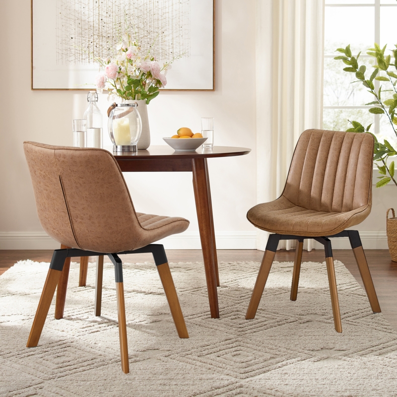 Bishaan Tufted Faux Leather Upholstered Swivel Dining Side Chair