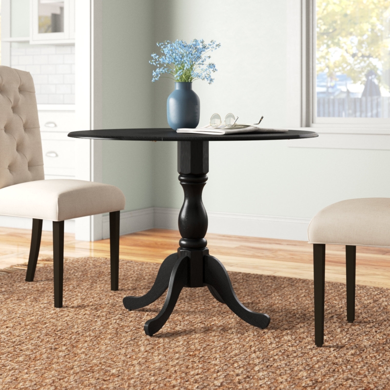 Arishka Extendable Round Solid Wood Dining Table