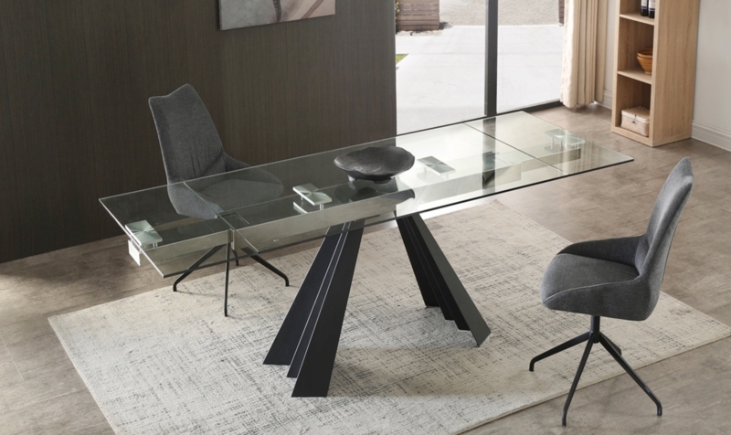 Daryla 63" Clear And Black Glass And Metal Drop Leaf Pedestal Base Dining Table