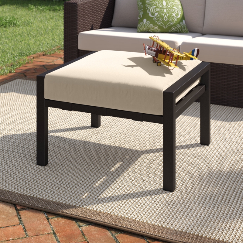 Abordale Metal Outdoor Ottoman with Sunbrella Cushion