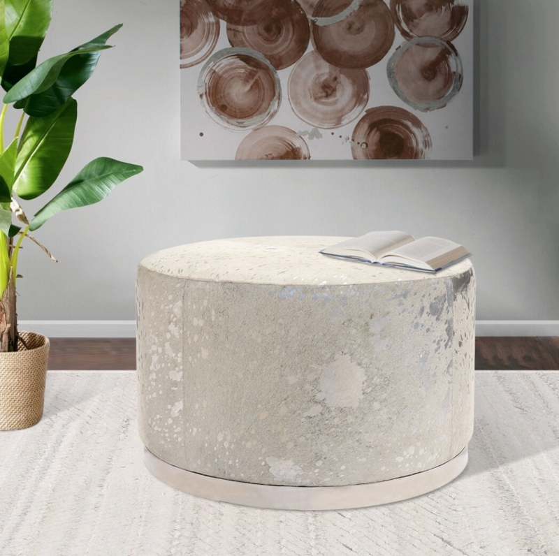 Safari Cowhide Upholstered with Stainless Steel Base Ottoman