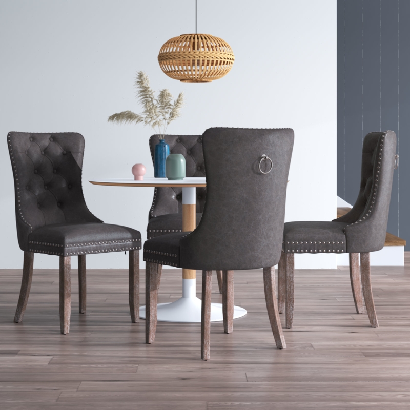 Alexes Tufted Leather Upholstered Wing Back Dining Chair Featuring Water And Stain Resistance