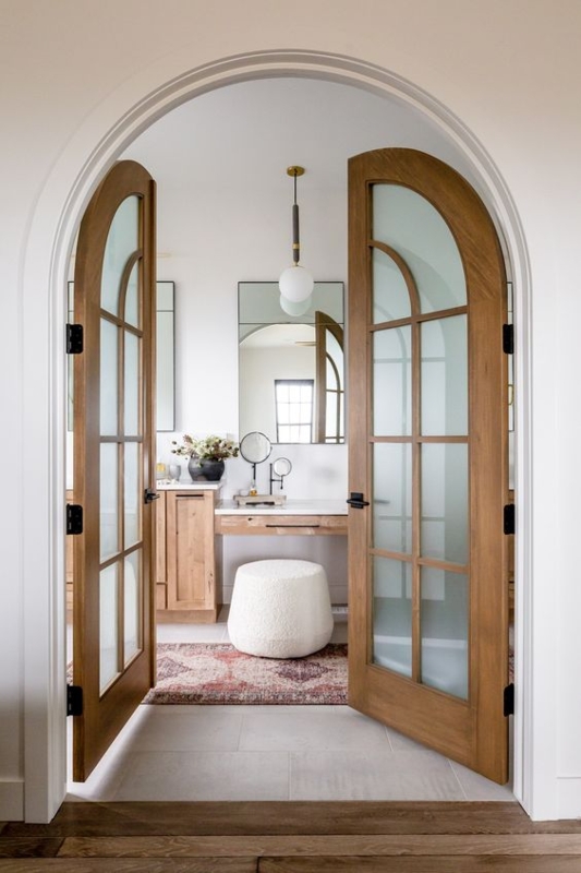Arched French Doors for Elegant Bathroom Entry