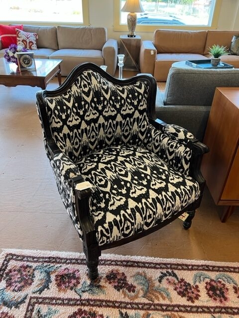Black and White Patterned Accent Chair in Living Room