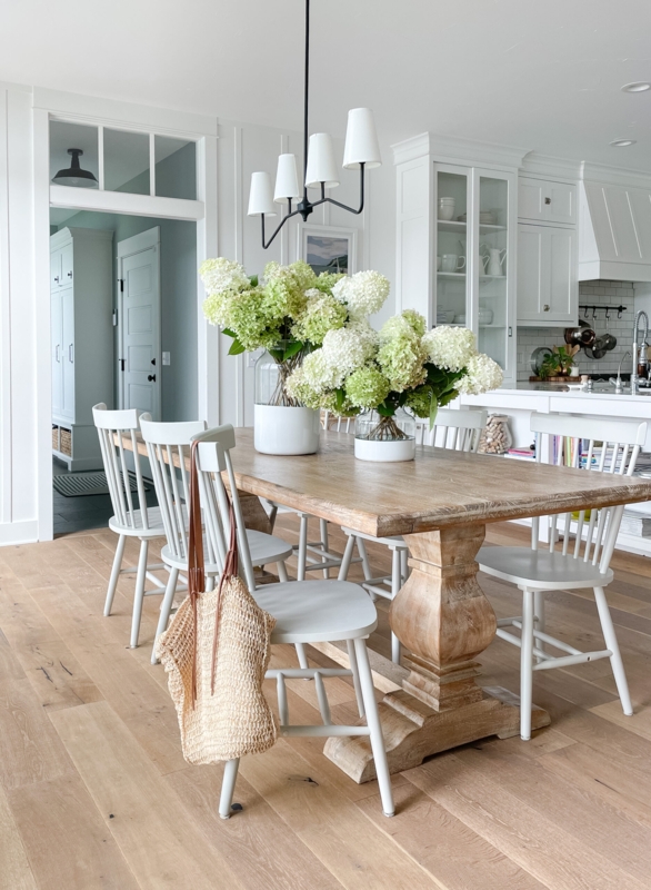 Bright Coastal Dining Room with Wooden Farmhouse Table