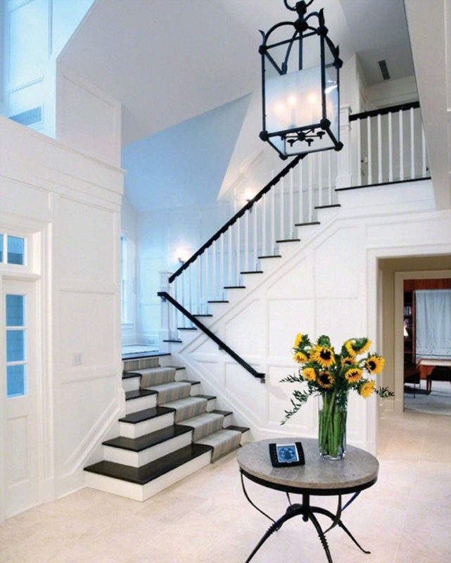Bright Elegant Two-Story Entryway with Sunflowers