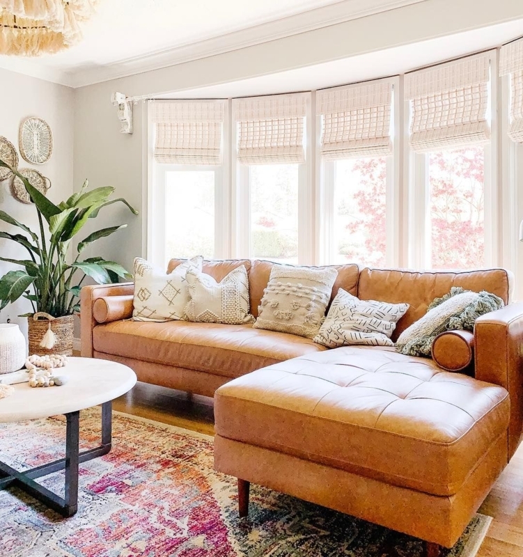 Caramel Leather Sectional Sofa with Cozy Throw Pillows