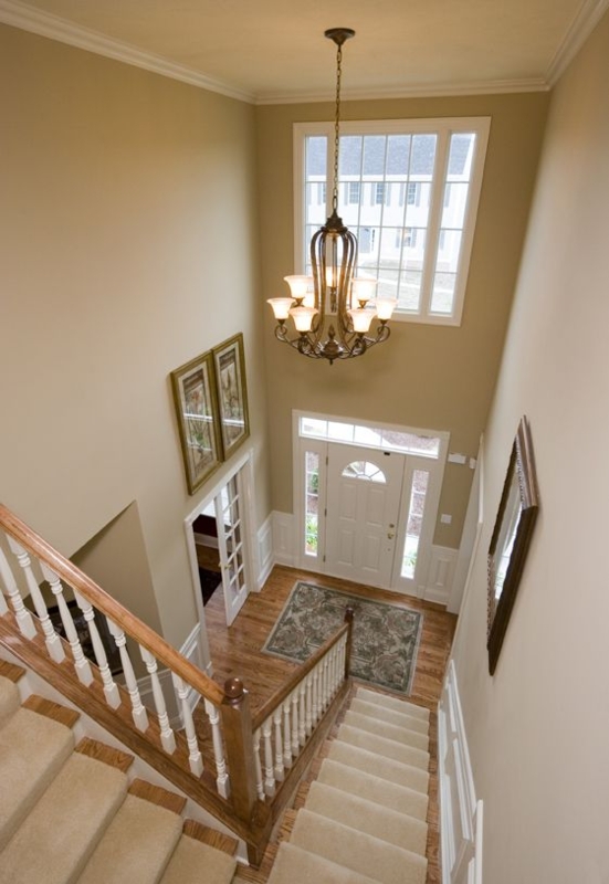 Classic Two-Story Foyer with Elegant Chandelier
