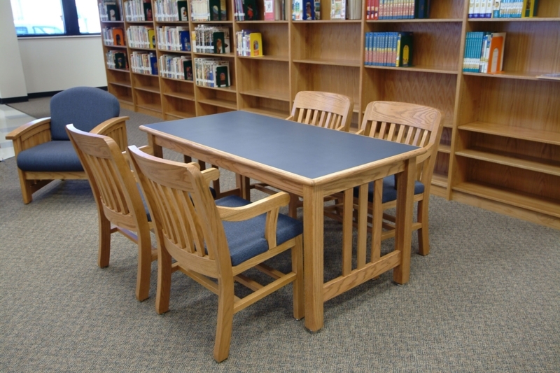 Classic Wooden Library Table with Blue Upholstered Chairs