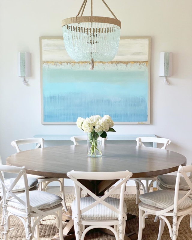 Coastal Dining Room with Round Wooden Table
