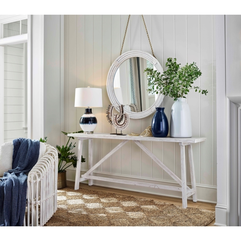 Coastal Living Room Entryway with Round Mirror