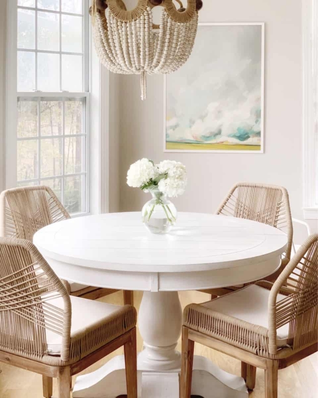 Coastal White Round Dining Table with Woven Chairs
